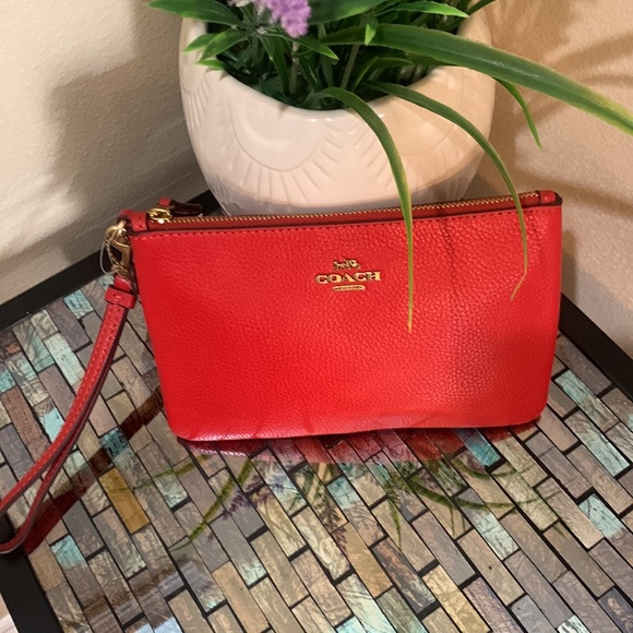 Coach Leather Wristlet
COACH - Picture 5 of 17